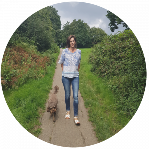 Satori Hypnotherapy | About | Image of Toni walking her dog Remi